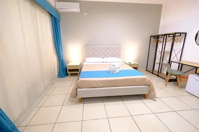 Letto o letti in una camera di Donna Elena B&B