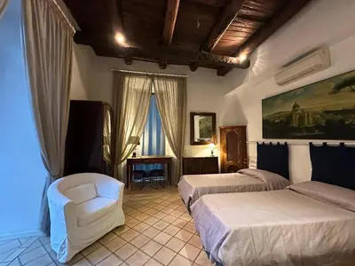 Letto o letti in una camera di La casa dell'architetto
