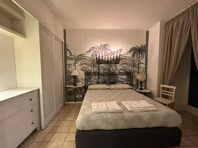 Letto o letti in una camera di La casa dell'architetto