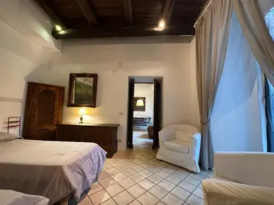 Letto o letti in una camera di La casa dell'architetto