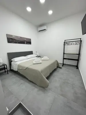 Letto o letti in una camera di B&B Cuore delle Zite