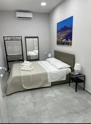 Letto o letti in una camera di B&B Cuore delle Zite