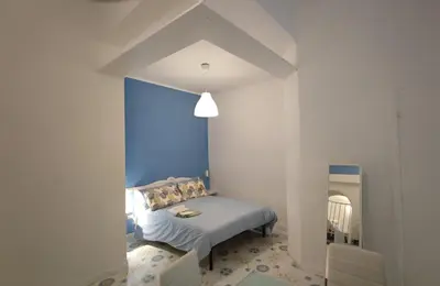 Letto o letti in una camera di A casa di Aurelio - Dimore Partenopee