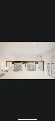 Letto o letti in una camera di La casetta di carmé