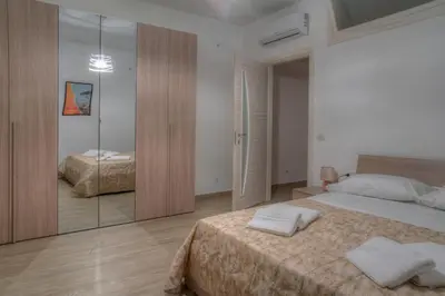 Letto o letti in una camera di Corso Vittorio Emanuele 110c