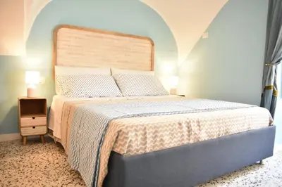 Letto o letti in una camera di La Casa sul Teatro