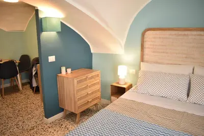 Letto o letti in una camera di La Casa sul Teatro