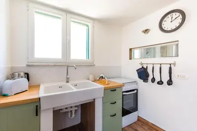 Cucina o angolo cottura di Viewsuvio Terrace at historical center by Napoliapartments