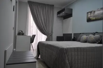 Letto o letti in una camera di HSUITE