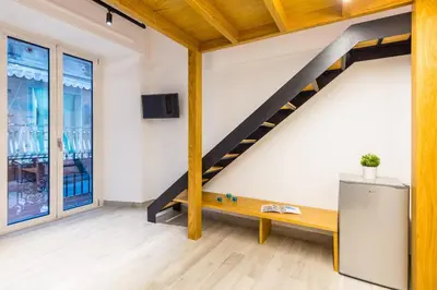 TV o dispositivi per l'intrattenimento presso Napoli Street Art Rooms by Wonderful Italy