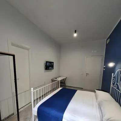 Letto o letti in una camera di Vulcania Rooms