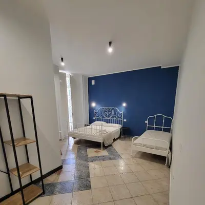 Letto o letti in una camera di Vulcania Rooms