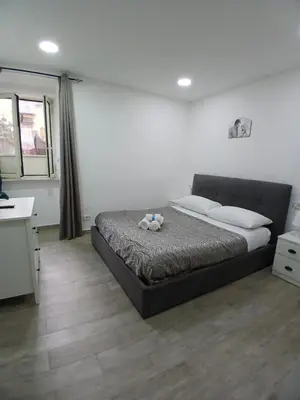 Letto o letti in una camera di House San Gennaro