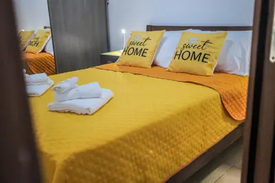 Letto o letti in una camera di La casetta di Virginia