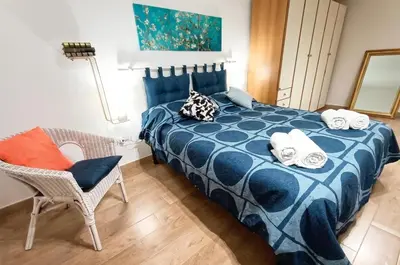 Letto o letti in una camera di A Casa e Cardetella