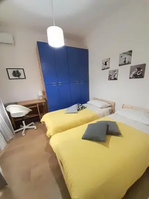 Letto o letti in una camera di A Casa e Cardetella