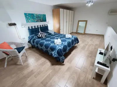 Letto o letti in una camera di A Casa e Cardetella