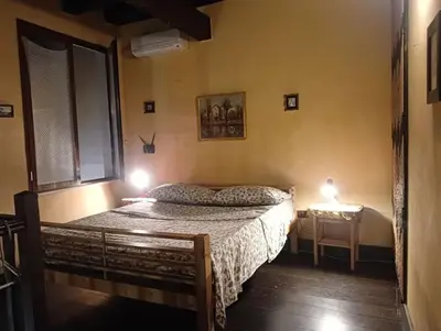 Letto o letti in una camera di Appartamento centro storico 2