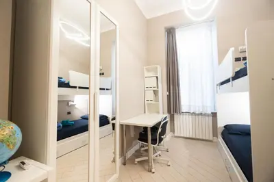 Letto o letti in una camera di Amedeo Suite - Il salotto di Napoli
