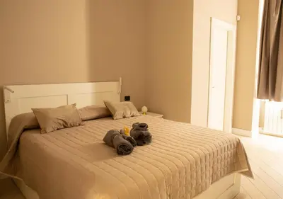 Letto o letti in una camera di Amedeo Suite - Il salotto di Napoli
