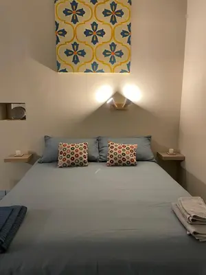 Letto o letti in una camera di Casa Del Monte