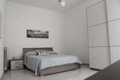 Letto o letti in una camera di O CORE E NAPULE