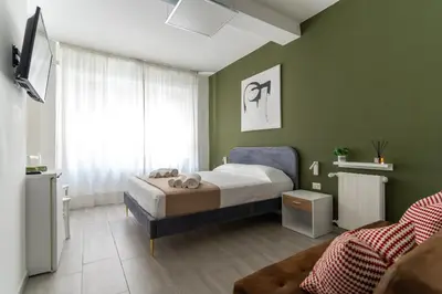 Letto o letti in una camera di Neapolitan Guest House Vittoria Colonna