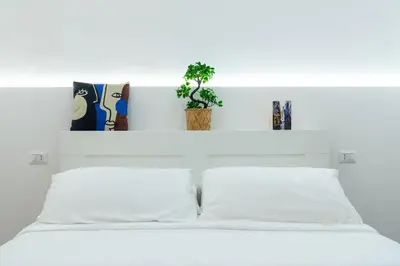 Letto o letti in una camera di CASA TUA MUSEO