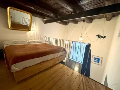 Letto o letti in una camera di Profumo Storico