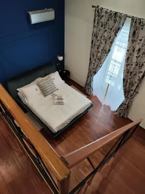 Letto o letti in una camera di Palazzo il Convento Universita