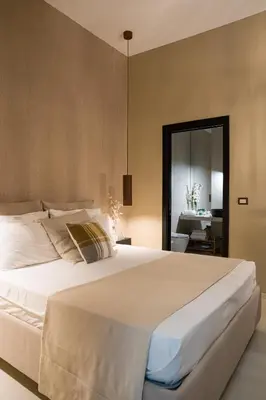Letto o letti in una camera di Aledo Boutique Apartments