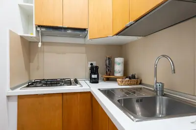 Cucina o angolo cottura di Casa Mavi by Ospitalia Napoli