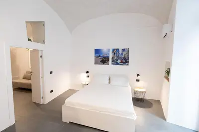 Letto o letti in una camera di Casa Mirelli By Dimorra