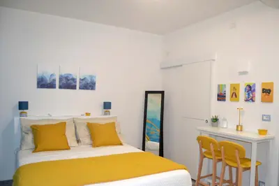 Letto o letti in una camera di Room&Chiaia
