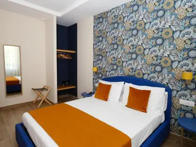 Letto o letti in una camera di Appartamento Salotto Vomero 7