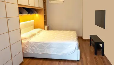Letto o letti in una camera di Folly Apartment