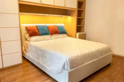 Letto o letti in una camera di Folly Apartment