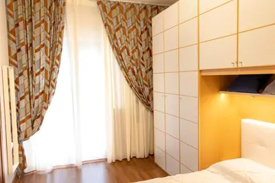 Letto o letti in una camera di Folly Apartment