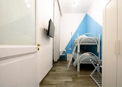 Letto o letti in una camera di Casa Cosmedin