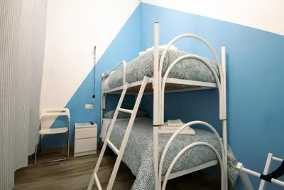 Letto o letti a castello in una camera di Casa Cosmedin