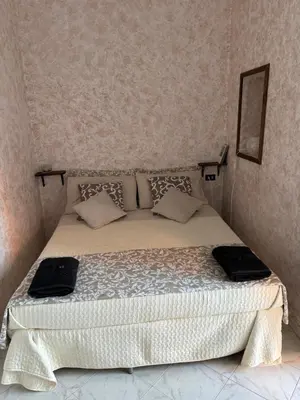 Letto o letti in una camera di Rian House