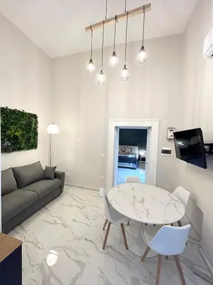 TV o dispositivi per l'intrattenimento presso Naples Apartment Plebiscito