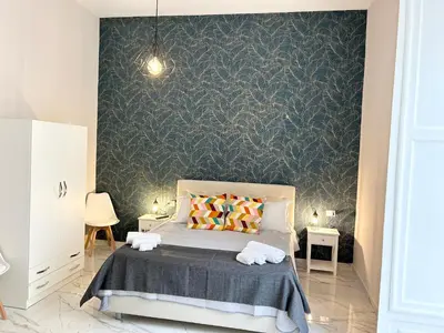 Letto o letti in una camera di Naples Apartment Plebiscito
