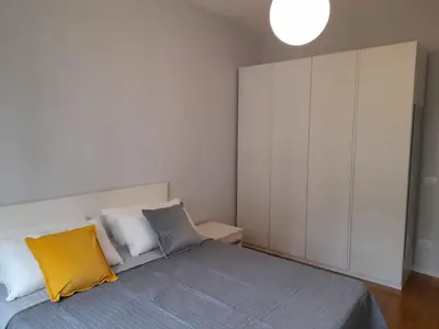 Letto o letti in una camera di Una Napoli FELICE