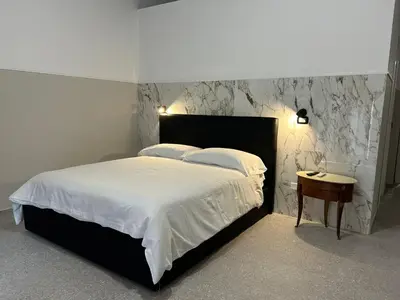 Letto o letti in una camera di La Suite del Centro Storico