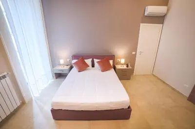 Letto o letti in una camera di Dimora Museo