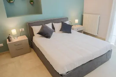 Letto o letti in una camera di Dimora Museo