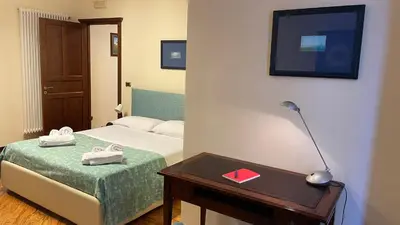 Letto o letti in una camera di Caravaggio Apartment