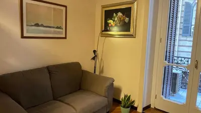 Area soggiorno di Caravaggio Apartment