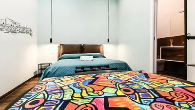 Letto o letti in una camera di Casa Calù Castel Sant'Elmo